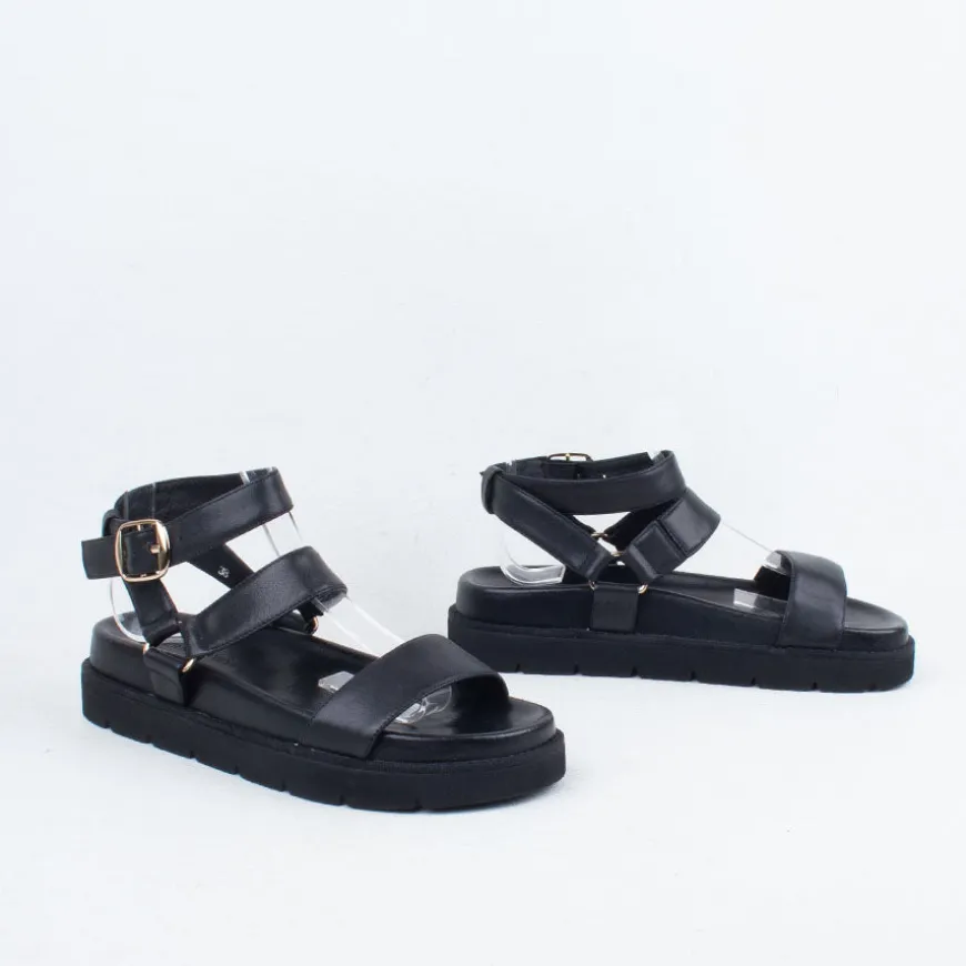 Nomi Sandal^Ernest Wyler New