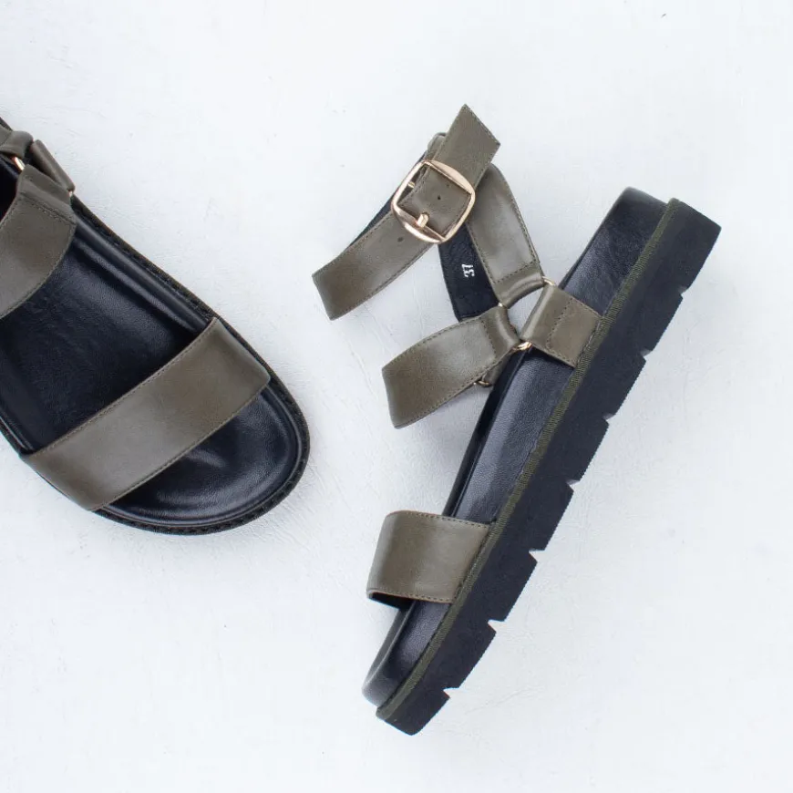 Nomi Sandal^Ernest Wyler New
